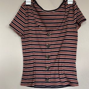 Orange ish and black striped shirt